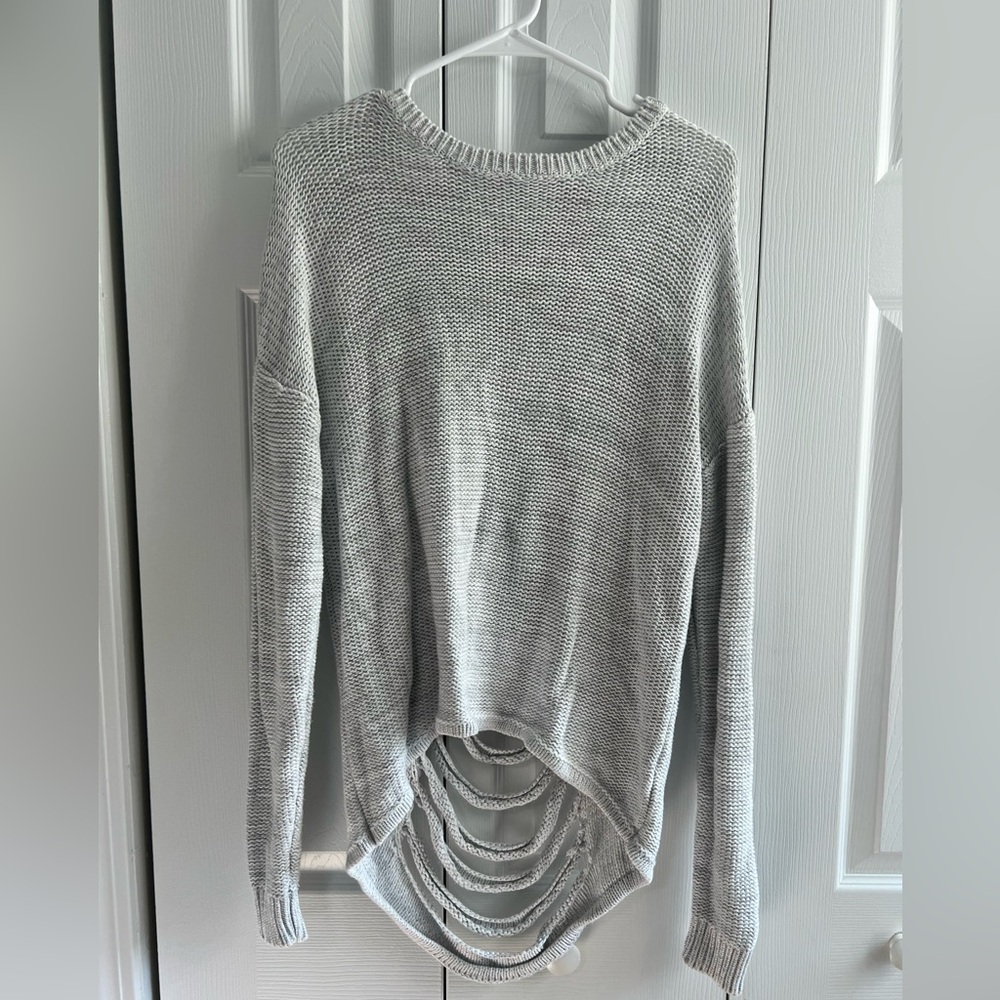 stitches and stripes grey sweater with cutouts in the back